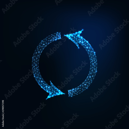 Futuristic glowing low polygonal round recycling symbol isolated on dark blue ba Fototapet
