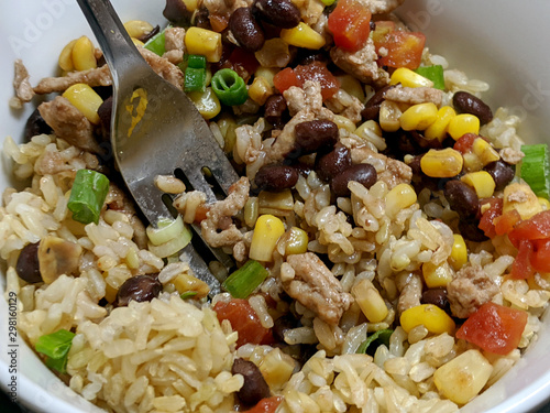 Ground Turkey, Corn, and Black Beans Over Rice in White Bowl