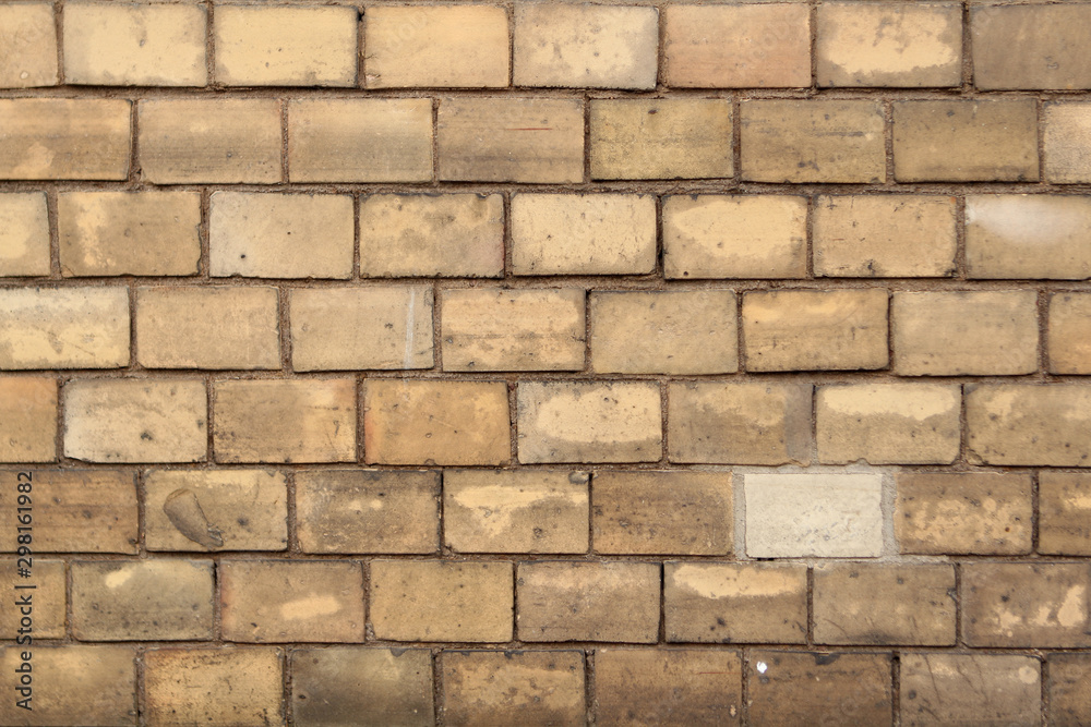 texture of an old light brick stone wall, background texture of an old light brick stone wall, background
