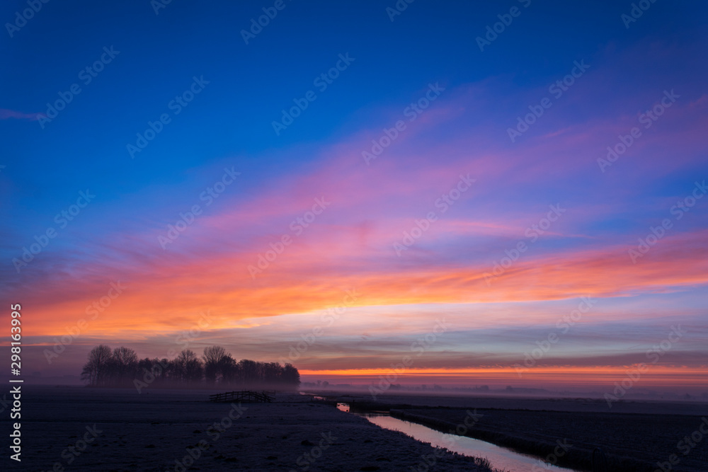 Sunrise in a polder