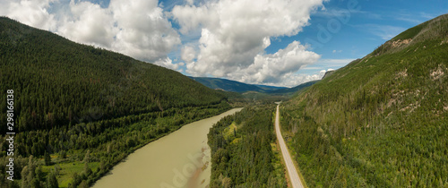 Aerial Panoramic View of a Scenic Highway in the Valley surrounded by Canadian Mountain Landscape. Taken near Clearwater, North of Kamloops, British Columbia, Canada.