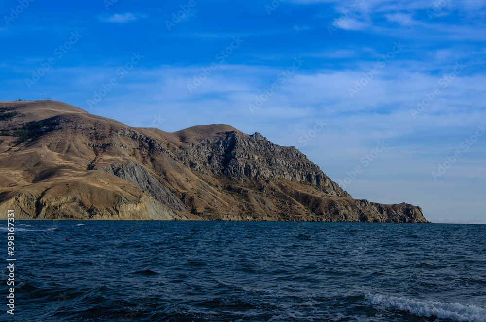 Seascape, day, sea, mountains rocky coast.