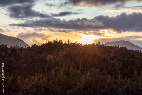 Beautiful View of American Landscape on the Ocean Coast during a dramatic stormy sunset. Taken in Ketchikan, Alaska, United States. © edb3_16