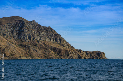 Seascape, day, sea, mountains rocky coast.