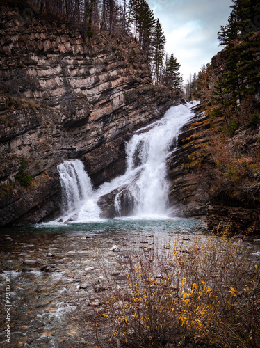 Beautiful Canadian waterfall in fall landscape