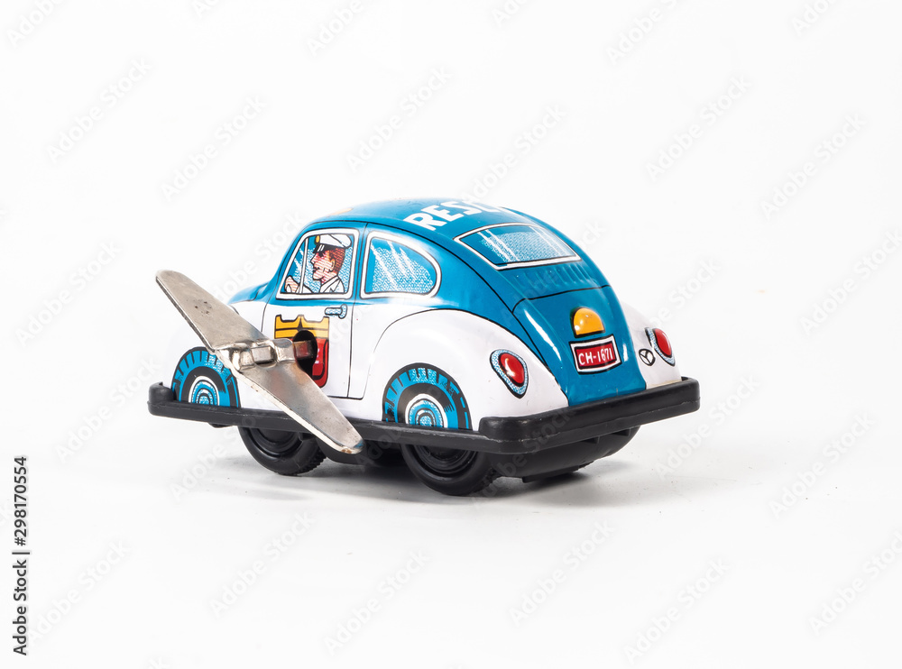 Obraz premium car tin toy on white background