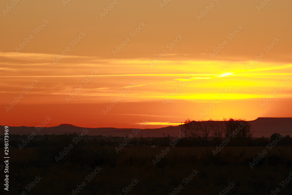 Beatiful sunset in the mountains next to cornfields Beatiful sunset in the mountains next to cornfields