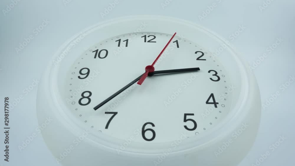 Close up White wall clock face beginning of time 02.30 am or pm on white background, Time lapse moving fast. Close up White wall clock face beginning of time 02.30 am or pm on white background, Time lapse moving fast.