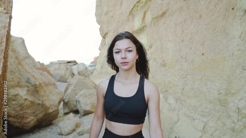 Young adult girl with sporty body smiling and spending day outdoor Young adult girl with sporty body smiling and spending day outdoor
