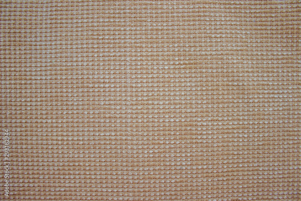 The fabric texture is beige. background with blank space for text. copy space, top view The fabric texture is beige. background with blank space for text. copy space, top view
