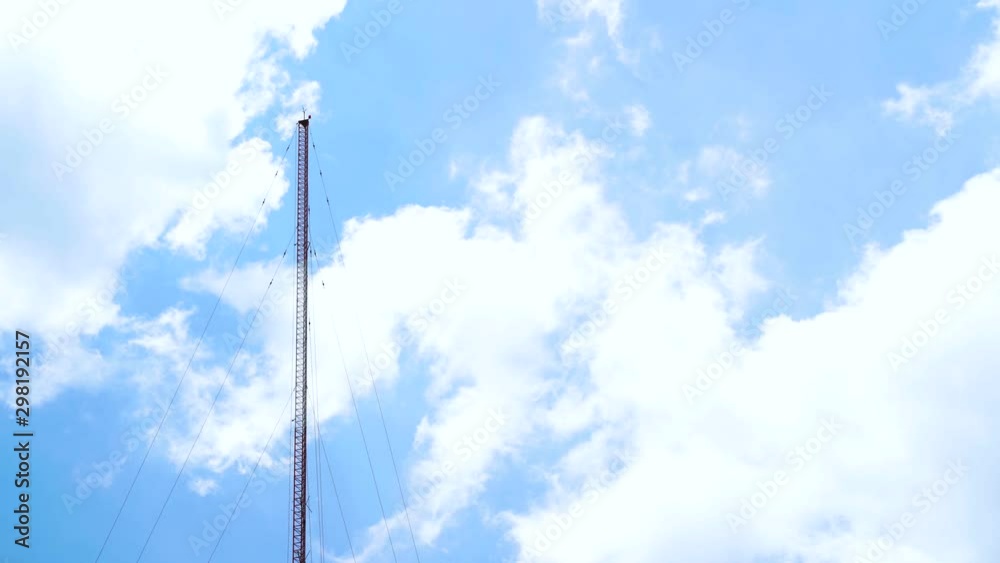 4K video, clear sky background with clouds and radio towers in Phuket, Thailand. 4K video, clear sky background with clouds and radio towers in Phuket, Thailand.
