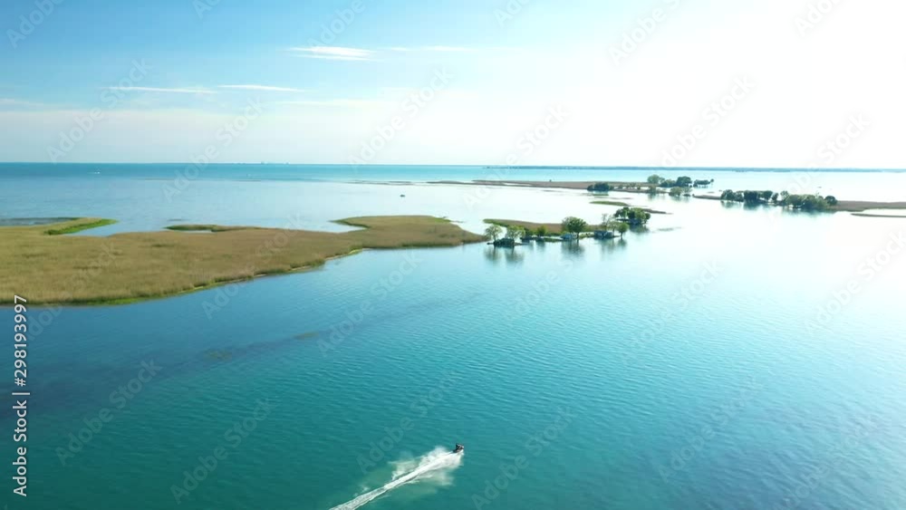 Jet skis ripping pristine open Michigan water Jet skis ripping pristine open Michigan water