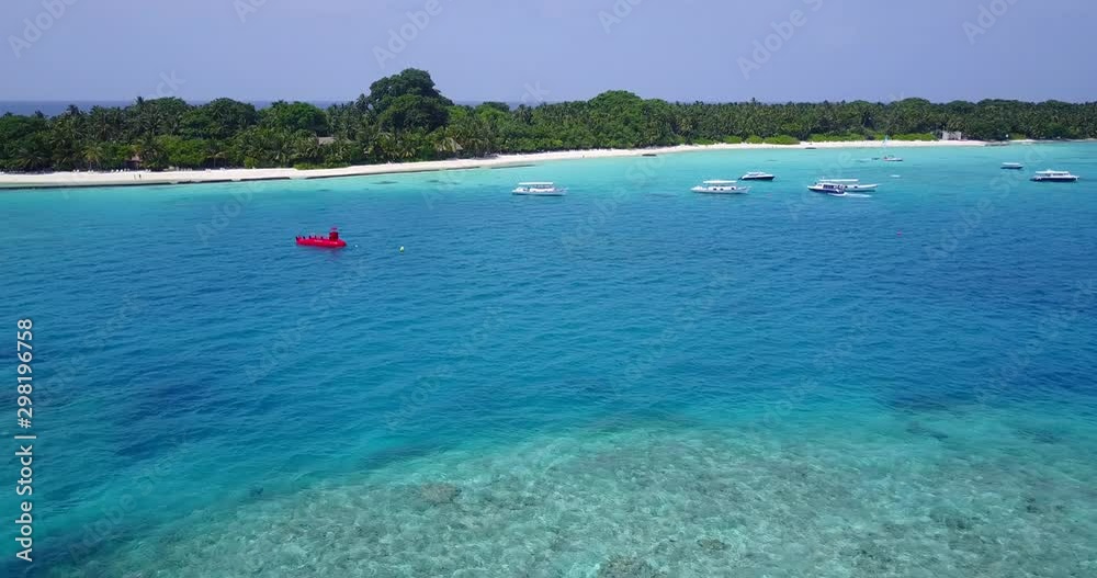 Boats outside of an isolated island in Thailand Boats outside of an isolated island in Thailand