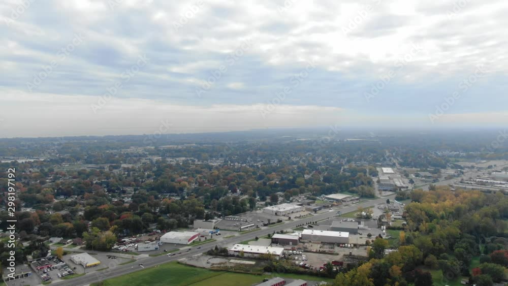 Drone flying over Clinton Township in cloudy conditions Drone flying over Clinton Township in cloudy conditions