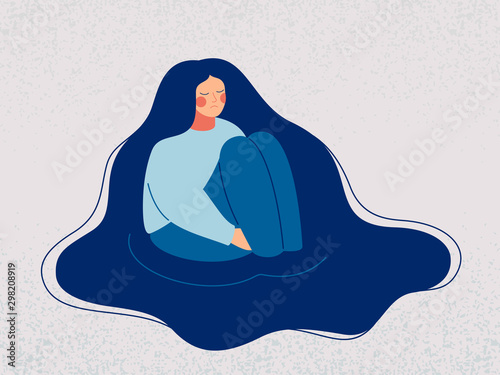 Depressed woman wallows in her sad thoughts. Upset woman sits in a puddle full of tears, her hands clasped around her ankles, immersed herself in sorrow recollections. Vector illustration photo