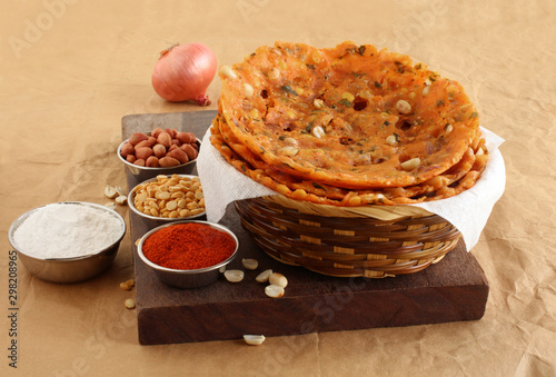 Sarva pindi, a dish native to the state of Telangana, India, is a delicious, spicy flat bread, and its ingredients like rice flour, peanuts, and lentils.