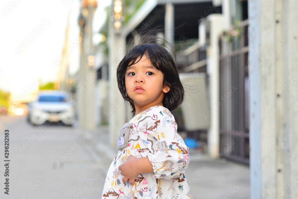 Little Child Girl lookback from The Local Village Street