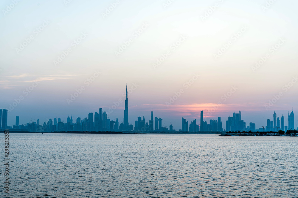 Amazing view of Burj Khalifa, World Tallest Tower along with downtown skyscrapers. A view from Dubai Creek Harbour.