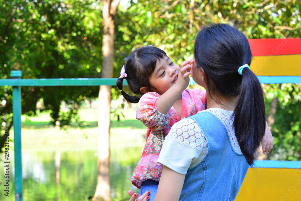 Little Child Girl Very Happy and Smile with Mother at The Public Park Little Child Girl Very Happy and Smile with Mother at The Public Park