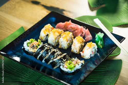 Japanese sushi set. Maki and rolls with tuna, salmon, shrimp, mango, crab and avocado