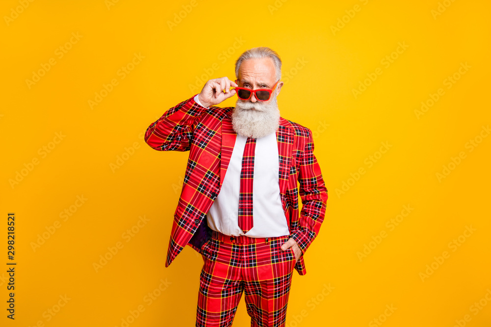 Portrait of his he nice handsome attractive serious content gray-haired man macho touching specs isolated over bright vivid shine vibrant yellow color background