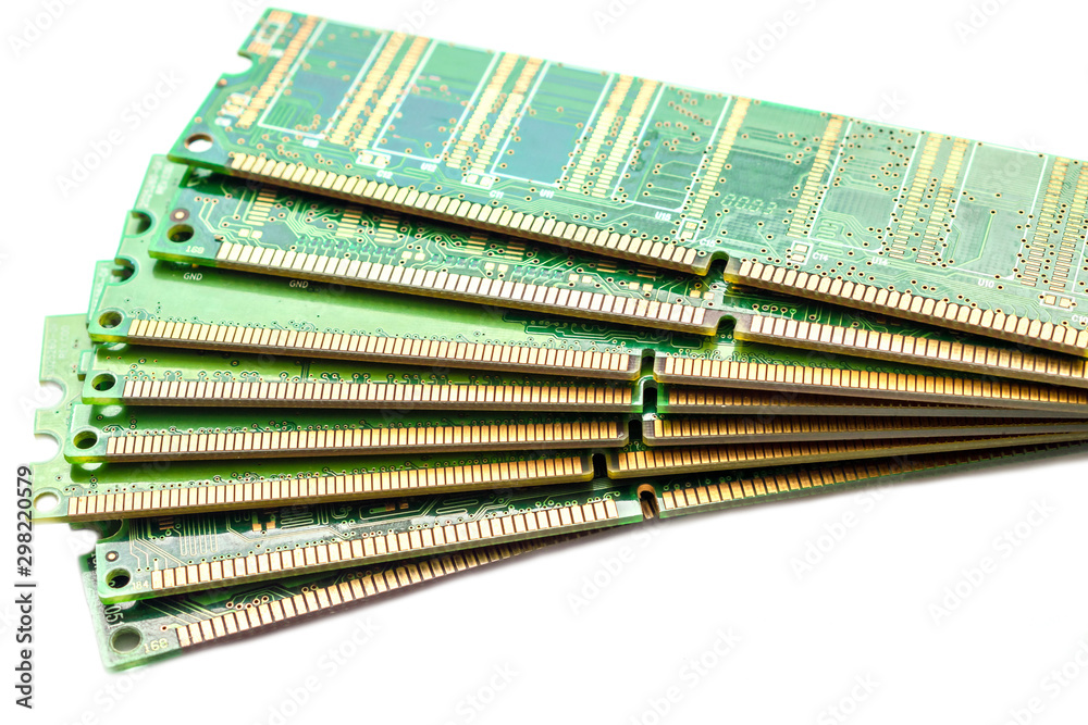 Many random access memory is a close up. Ddr and sdram main storage are each other. A bunch of memory modules are isolated on a white background. Computer technology concept. Many random access memory is a close up. Ddr and sdram main storage are each other. A bunch of memory modules are isolated on a white background. Computer technology concept.