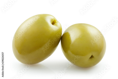 Close-up of two delicious green olives, isolated on white background