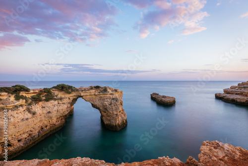 Portuguese coast line with Elephant Shaped Cliff in Algarve during the Sunset, Portugal