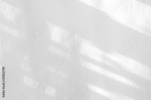 Organic drop diagonal shadow on a white wall, overlay effect for photo and mockups