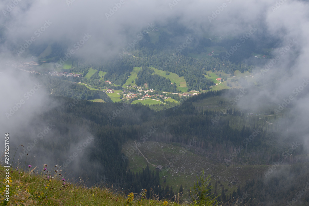 View from the Watzmannhaus through some clouds on Ramsau