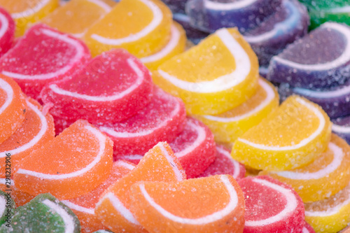 Sweet jelly beans close-up. There are sugar crystals on it.