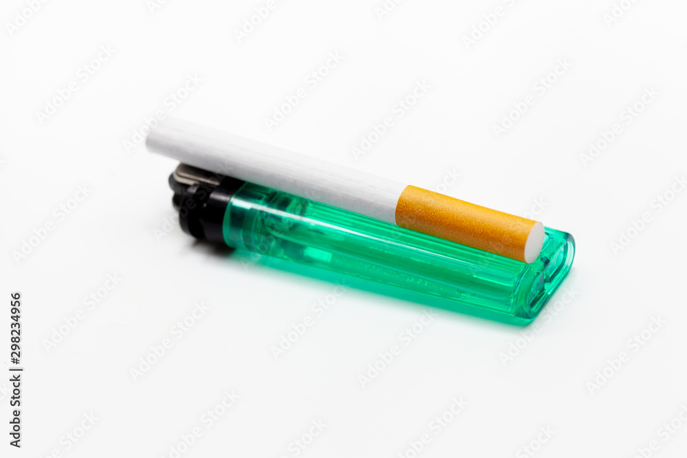cigarette and lighter isolated on white background