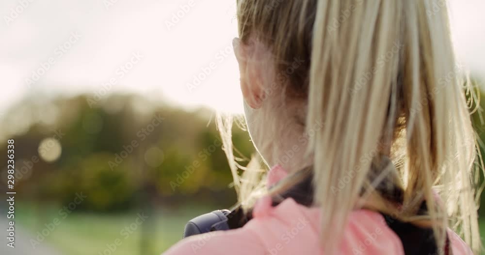 Handheld video shows of sporty woman in the park Handheld video shows of sporty woman in the park
