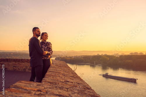 Lovers. romantic at sunset. Couple smiling and enjoying together