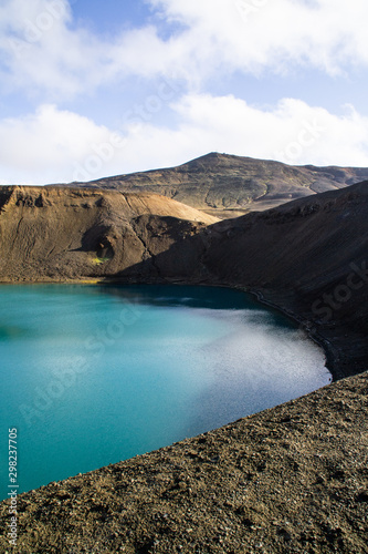 View of Krafla volcano crater with water, tourist popular attraction in Lake Myvatn, Iceland © Dajahof