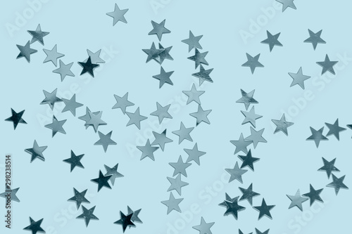 Star confetti toned blue Christmas background