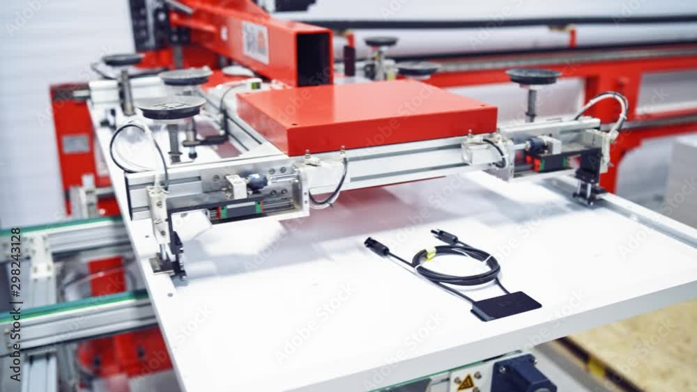 production of solar panels, Industrial robot working in factory,Conveyor Tracking Controler of robotic hand. Assembly line at plant. Process closeup video. production of solar panels, Industrial robot working in factory,Conveyor Tracking Controler of robotic hand. Assembly line at plant. Process closeup video.
