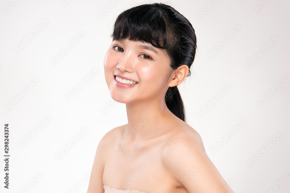 Beautiful Young Asian Woman smile feeling so happy and cheerful. with healthy Clean and Fresh skin. isolated on white background. Beauty Cosmetics Concept Beautiful Young Asian Woman smile feeling so happy and cheerful. with healthy Clean and Fresh skin. isolated on white background. Beauty Cosmetics Concept