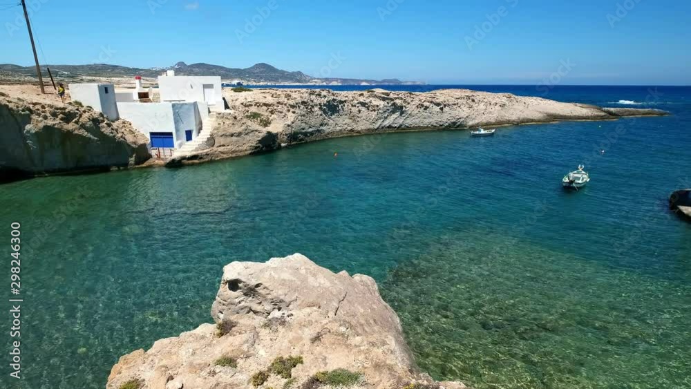 Typical small fishermen' village on Milos island, Greece - panning Typical small fishermen' village on Milos island, Greece - panning