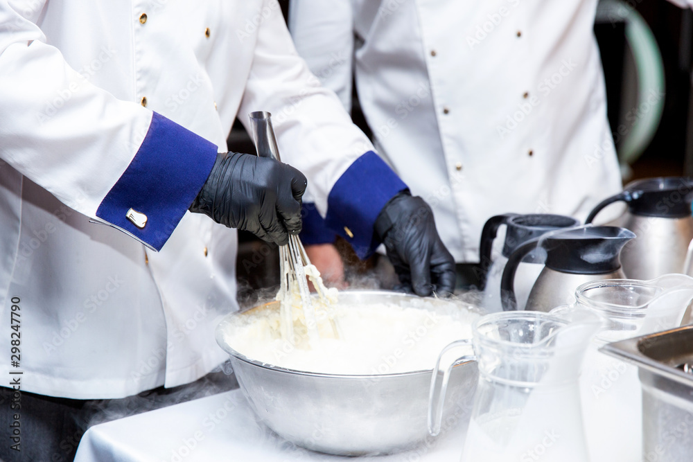 Chef is cooking ice cream with liquid nitrogen