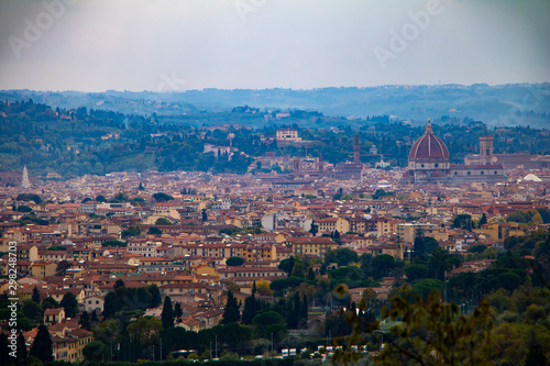Panoramic view of Florence, Tuscany region city in Italy. Red roofs and Cathedral spire. Beautiful cityscape from the top.