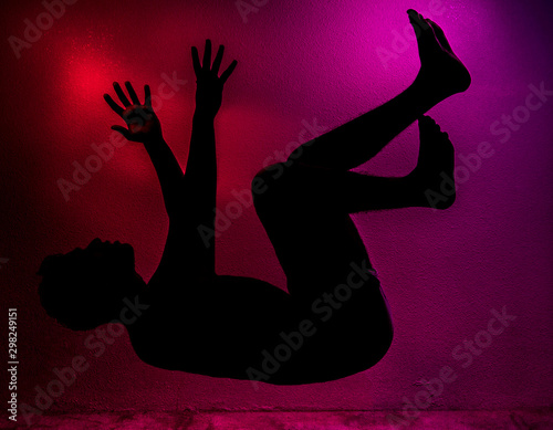 silhouette of a man floating in the air