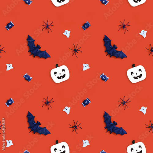 Seamless pattern of Halloween decorations and candy