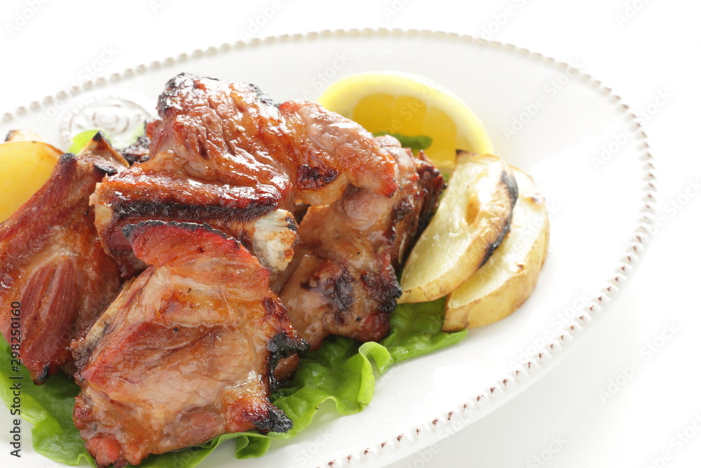 Korean food, pork spareribs barbecue served with lemon for gourmet food image Korean food, pork spareribs barbecue served with lemon for gourmet food image