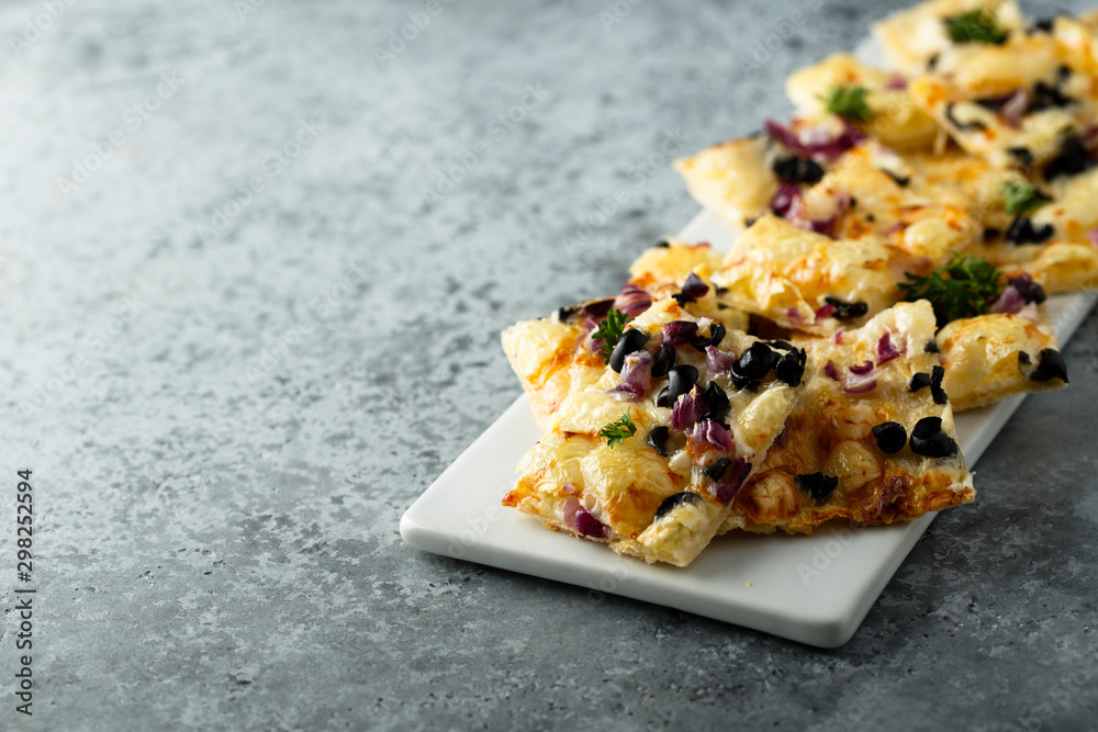 Homemade savory tart with onion and olives Homemade savory tart with onion and olives