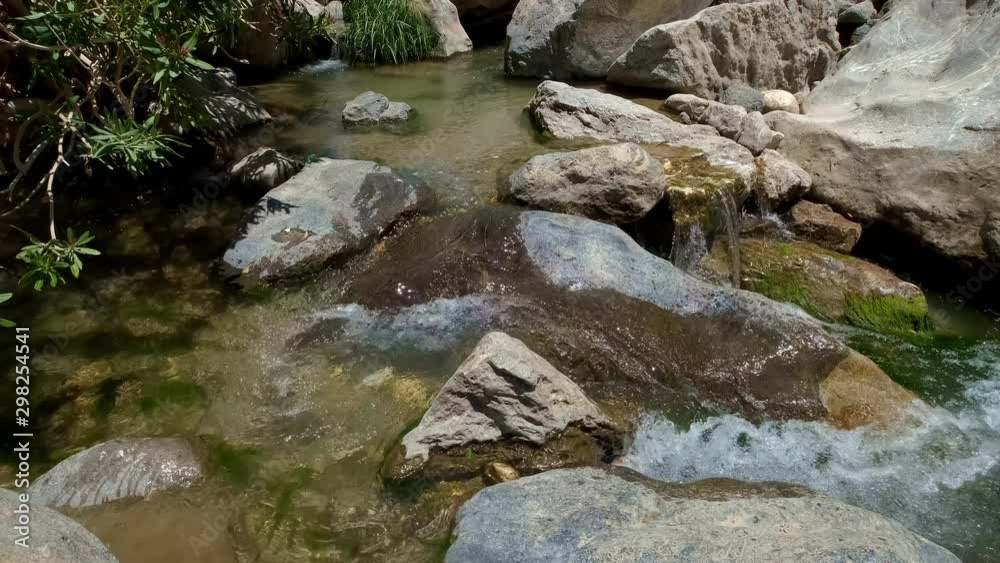 Fresh clear water spring and stones Fresh clear water spring and stones