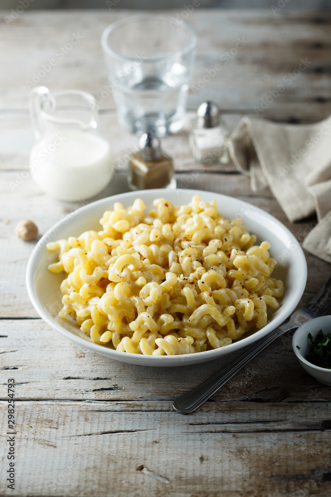 Homemade macaroni with cheese sauce Homemade macaroni with cheese sauce