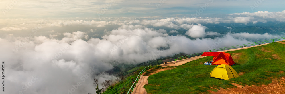 Wide panorama beautiful nature scenic sunrise foggy landscape Phu Tabberk, Camping and tent on top view mountain, Landmark tourist travel Phetchabun Thailand outdoor vacation, Tourism destination Asia Wide panorama beautiful nature scenic sunrise foggy landscape Phu Tabberk, Camping and tent on top view mountain, Landmark tourist travel Phetchabun Thailand outdoor vacation, Tourism destination Asia