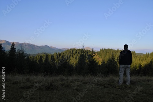 man admires the mountain landscape