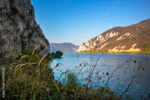 Autumn morning on the river surrounded by mountains. Danube river in Djerdap national park in Serbia on Romanian Border.